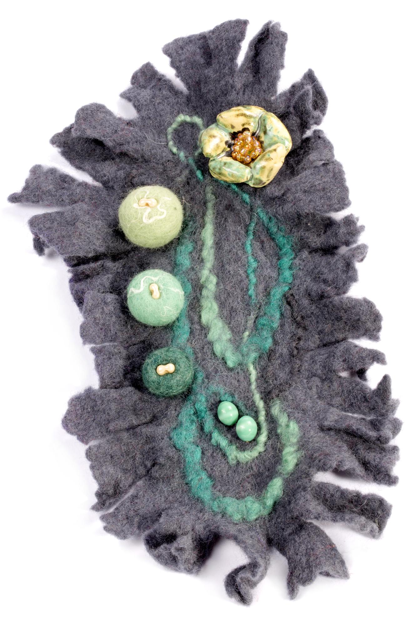 Assortment of embroidered patches arranged on table