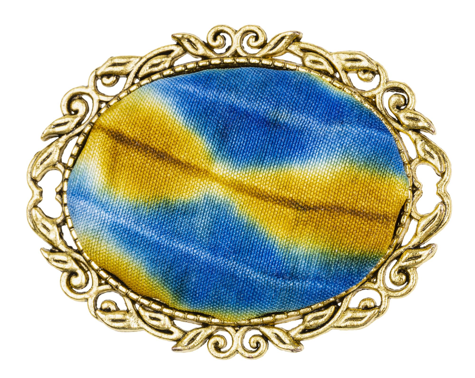 Restored embroidered badge after service